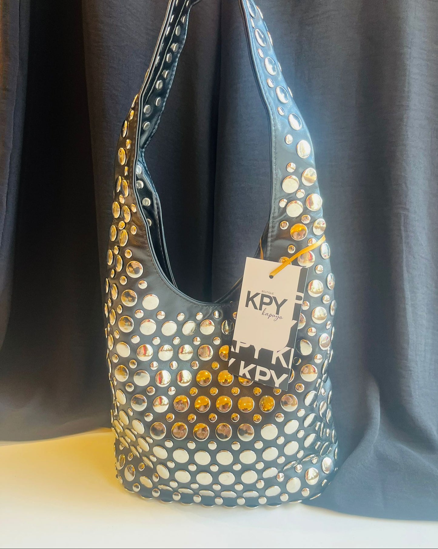 Cartera Tachas
